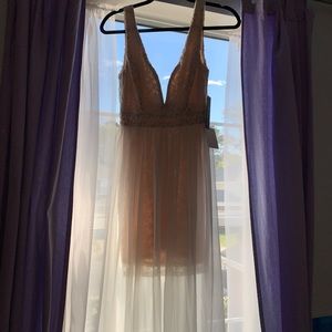 Lacy white mini-dress with sheer overlay